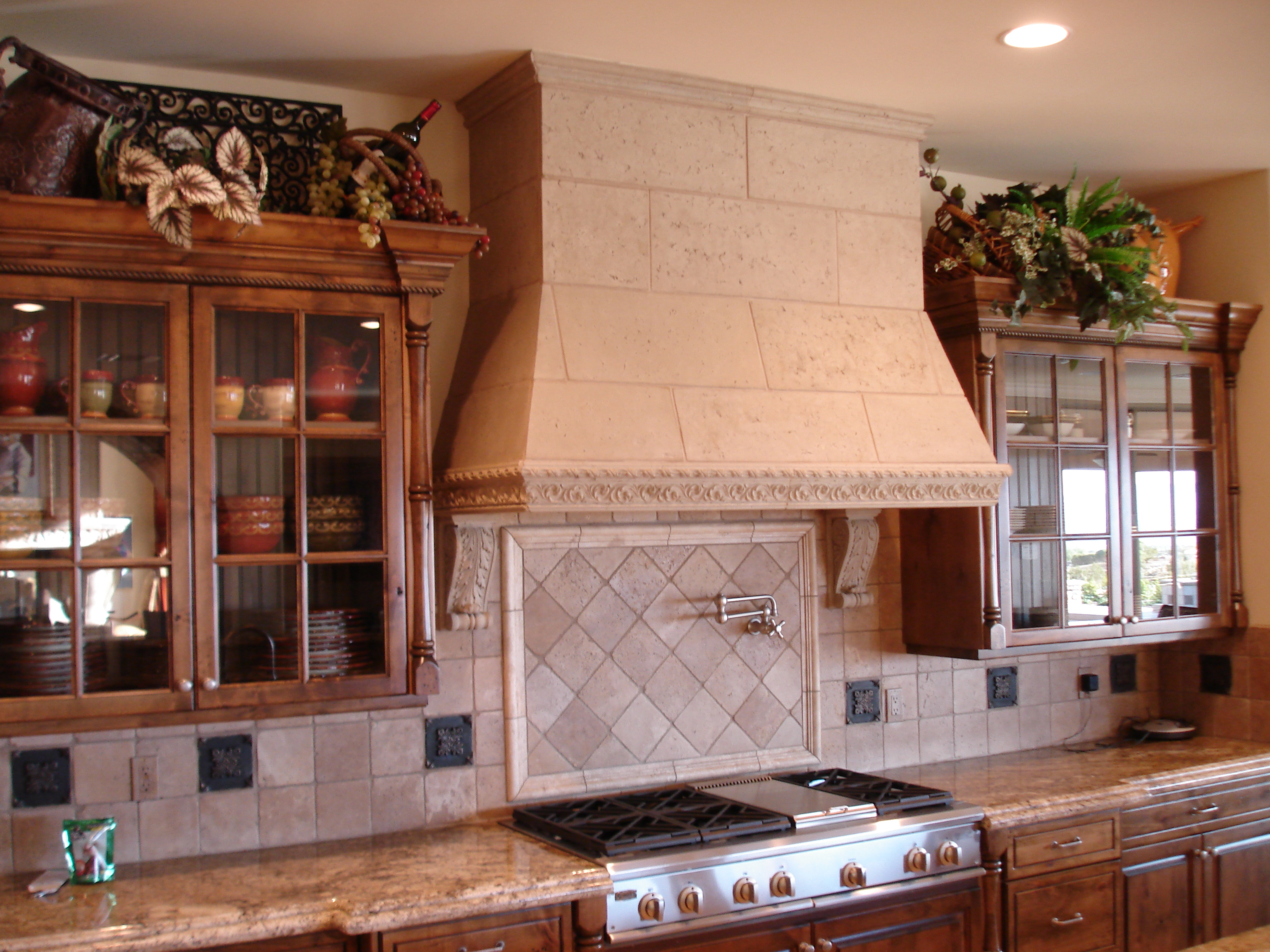 DRESS UP YOUR KITCHEN WITH A DECORATIVE RANGE HOOD