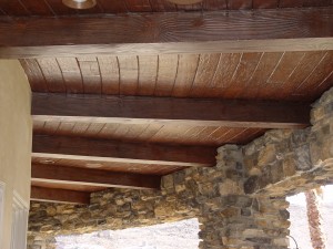 exterior faux wood beams and ceiling by Realm of Design